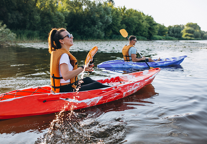 kayaking on river desktop 715x500